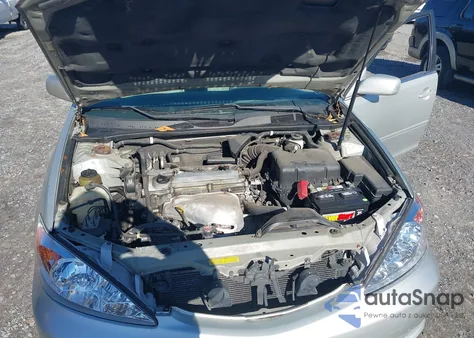 2002 Toyota Camry Le z USA, uszkodzony, nr VIN 4T1BE32KX2U117098